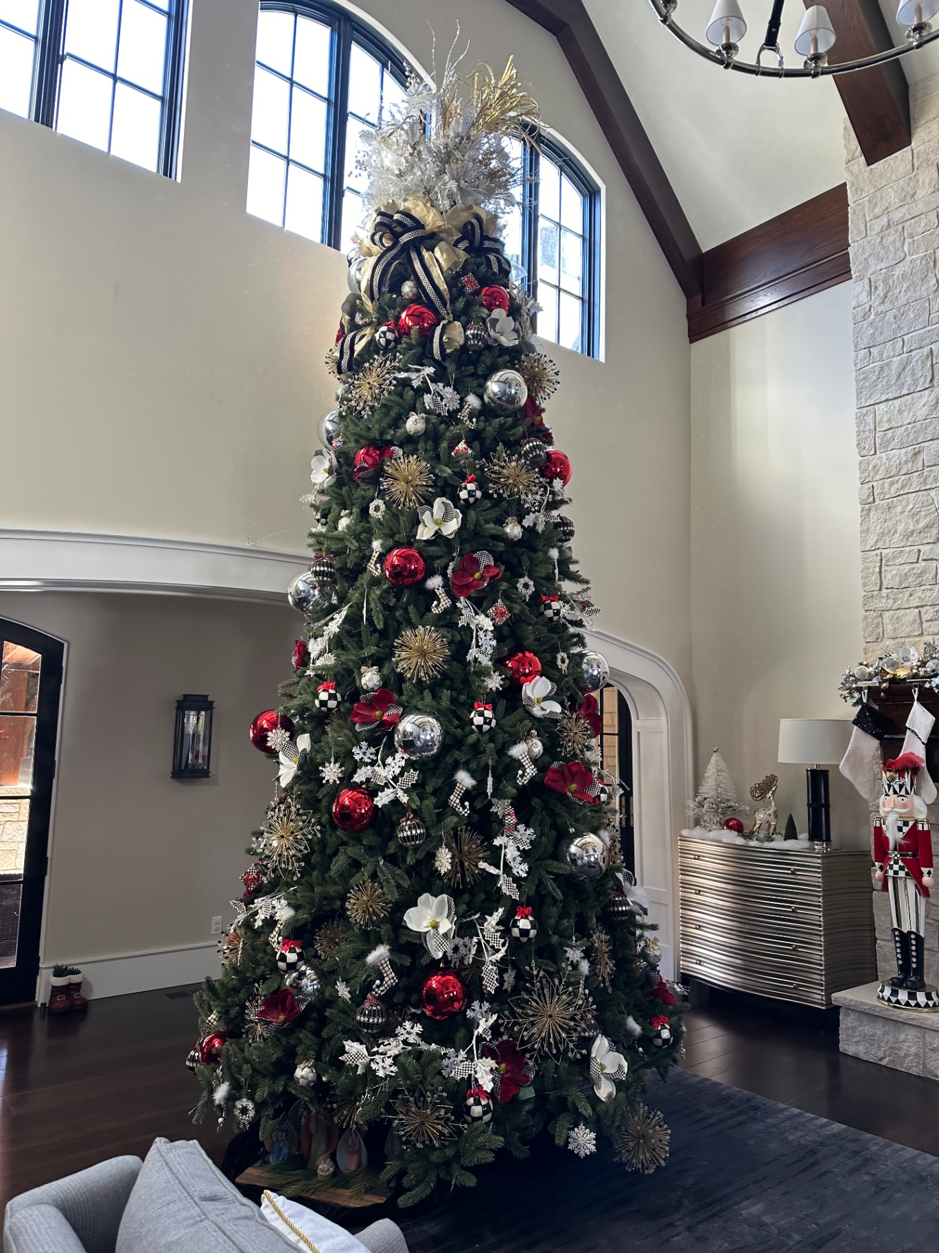 Decorated interior Christmas tree installed in a Ladue home